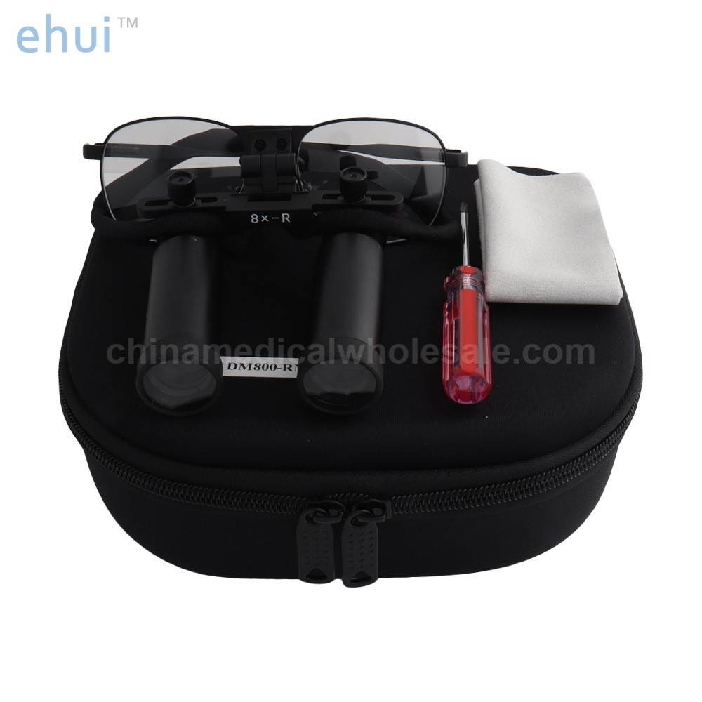 Oral binocular medical otorhinolaryngological examination with spectacle magnifying glass