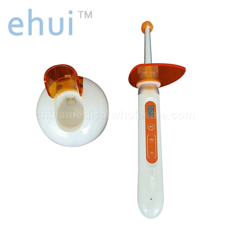 Dental light curing lamp with three intensity composite modes