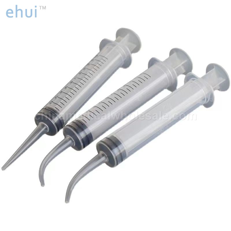 Straight disposable flushing elbow syringe