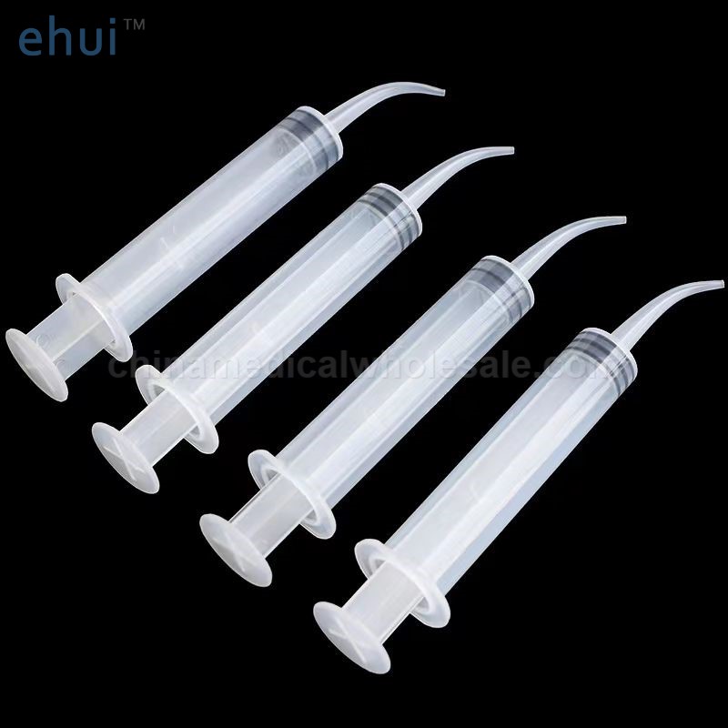 Straight disposable flushing elbow syringe